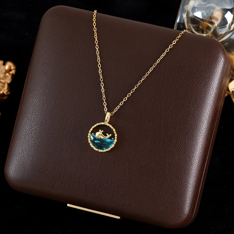 The Laboon Ocean Whale Necklace - Blue Crystal & Gold