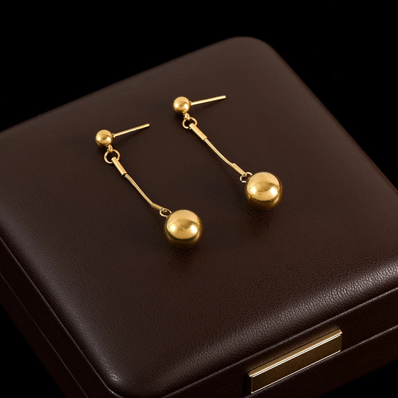The Sloane Sphere & Snake Chain Earrings - Modern Gold Drops